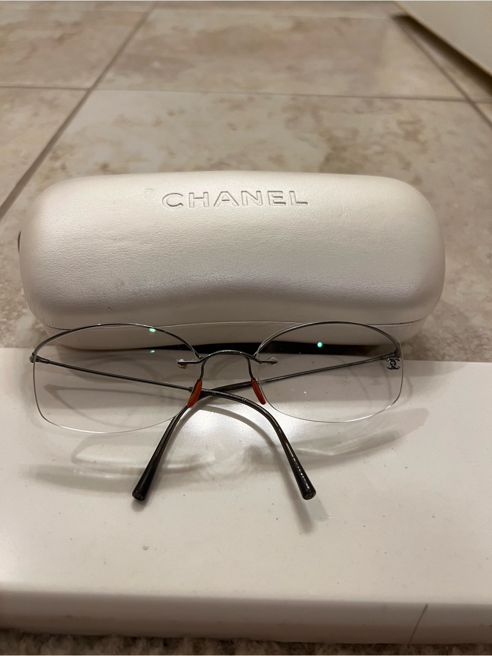 CHANEL Rimless Reading Glasses in Silver with Orange Accents with a case
